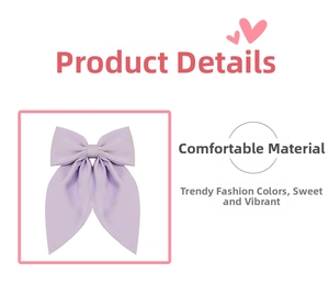 Detail view of the soft lavender satin bow hair clip with elegant long ribbons