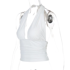 Close-up of white halter neck top with ruched texture on a transparent mannequin