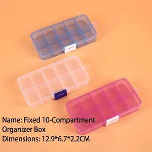 Macro detail of fixed 10-compartment PP plastic storage boxes in three transparent colors