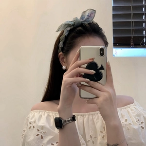 Floral print fabric headband with a stylish bow knot for women in a light blue shade