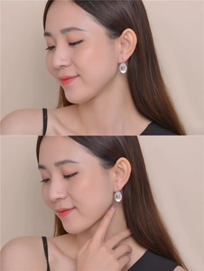 Close-up of model wearing oval ice-crack textured earrings with zircon accents