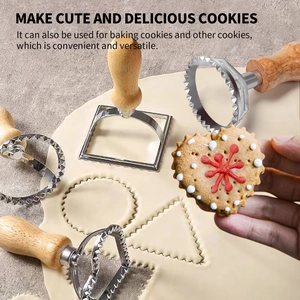 7-piece stainless steel cookie mold set with wooden handles featuring round and heart shapes