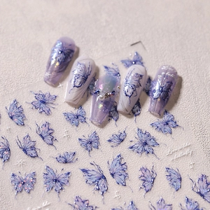 3D embossed holographic butterfly nail stickers in blue and purple with aurora metallic finish