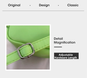 Detailed view of the light green mini backpack's adjustable silver metal buckle and strap