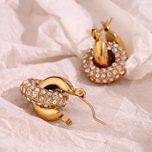 Macro view of 18K gold-plated hoop earrings with micro-inlaid white rhinestones
