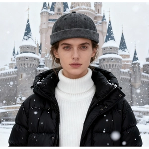 Detail view of washed cotton miki hat in dark grey with vintage texture and top air vents