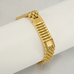 Polished 18K gold stainless steel watch link bracelet for men on display stand
