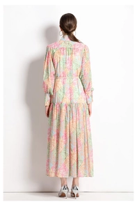 Rear view of vintage floral print maxi dress with colorful patchwork and lantern sleeves