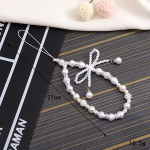 Cordino per cellulare con perle e fiocco, dettagli in strass, lunghezza 21 cm