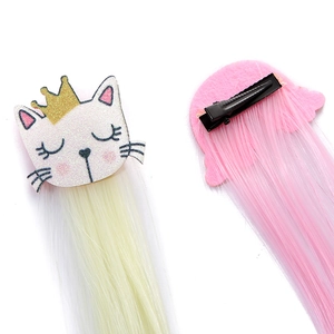 Child hair clip with a pink cartoon cat and long straight rainbow hair extensions