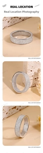 Macro detail of triple row pavé moissanite ring showing S925 sterling silver stamp