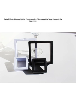 Detail shot of black and white 3D floating frame jewelry boxes with clear PE film