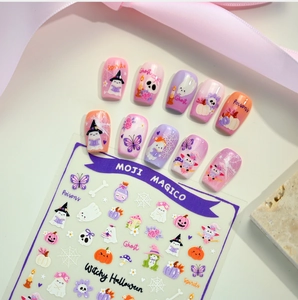 Detailed view of matte Halloween nail stickers featuring ghosts, pumpkins, and magic themes