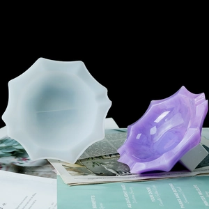 Detailed view of wave-edged star silicone mold for resin tray and purple marble storage box