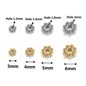 Stainless steel snowflake spacer beads for jewelry making in gold and silver finishes