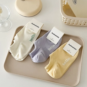Three pairs of breathable combed cotton low-cut socks in cream, purple, and yellow