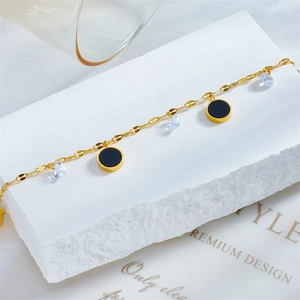 Waterproof gold titanium steel anklet with black shell charms and sparkling zircons