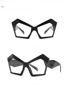Close-up of geometric polygon eyeglasses frames in black with anti-blue light lenses