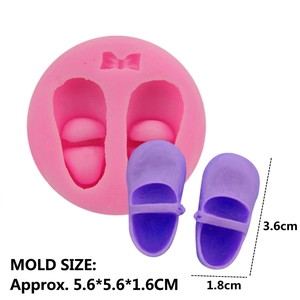 Pink silicone mold for baby shoes and bow fondant, featuring DIY cake baking craft design