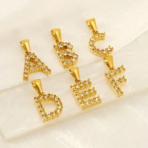 Pendentifs alphabet A-F en acier doré avec incrustations de zircones cubiques
