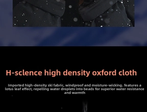 Detailed view of waterproof ski glove fabric showing water droplets on black surface