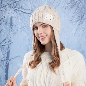 Chunky knit earflap beanie for women in cream white with colorful fiber accents
