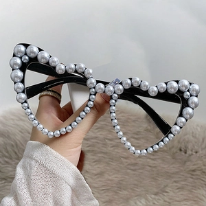 Chic heart-shaped sunglasses frame with white pearls and black frame for women