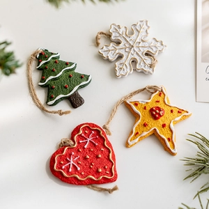Set of 4 vintage resin Christmas tree ornaments including star, snowflake and heart shapes