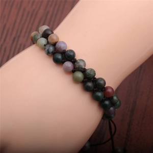 Detail of hand-woven wrap bracelet with 6mm Indian agate and rose quartz gemstone beads