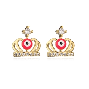 Macro shot of 18K gold plated crown earrings with red evil eye and zircon inlay