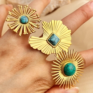 Bohemian gold ring set featuring turquoise stones in a retro sunburst design for women
