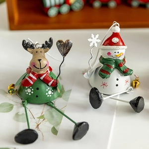 Christmas metal reindeer and snowman ornaments with hanging legs and small golden bells