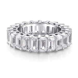 Macro detail of emerald cut zircon eternity ring in 925 sterling silver finish
