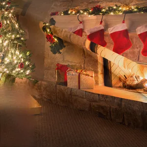 Detail showing the soft flannel material and festive Christmas fireplace printed pattern