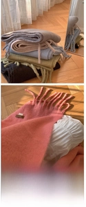 Detail shot of soft cashmere-feel knitted scarves with long fringes in macaron colors