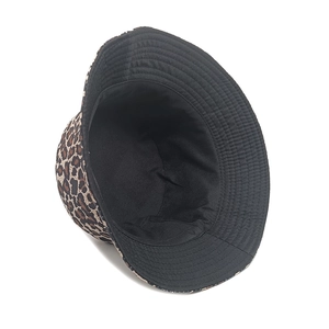 Detail view of double-sided leopard print bucket hat with precision brim stitching