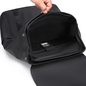 Black business laptop backpack with waterproof fabric and large interior compartment