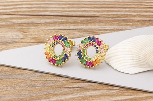 Macro detail of rainbow zircon sunflower earrings in 18k gold plated copper setting