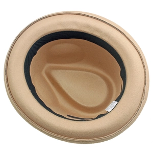 Detailed inner view of khaki felt jazz hat showing size 57 label and sweatband
