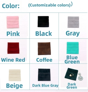 Detailed grid view showing nine velvet jewelry pouch colors with snap button closure