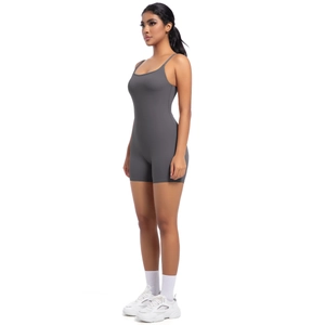 Detail of dark grey seamless yoga bodysuit showing slim fit side profile and stretchy fabric