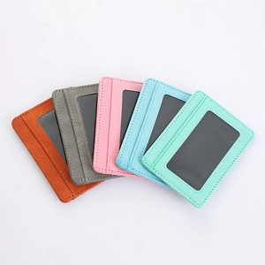 Waterproof PU leather passport covers in five pastel colors with transparent ID windows
