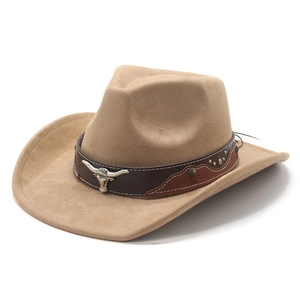 Detailed view of western cowboy hat with silver bull head emblem and metal studs