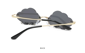 Detailed back view of rimless cloud-shaped sunglasses with gold-tone metal temples