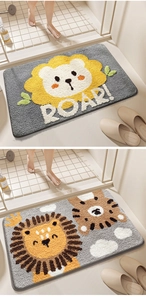Detail of plush lion and tiger bathroom mats with soft texture and anti-slip backing