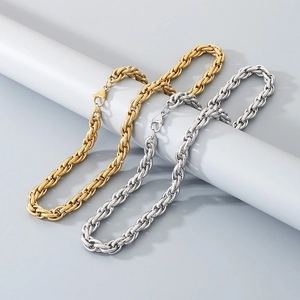 Close-up of gold and silver stainless steel hammered texture chains with lobster clasps
