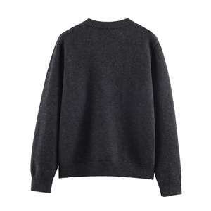Detailed back view of round neck knit sweater featuring premium ribbed cuffs and hem