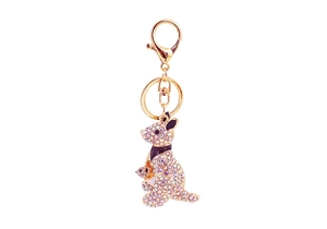 Detailed close-up of a golden kangaroo keychain featuring vibrant colorful rhinestones