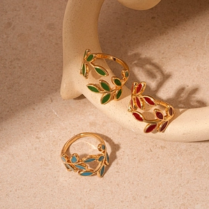 Set of three vintage gold leaf rings with green red and blue enamel drip oil finish