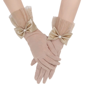 Elegant champagne sheer mesh gloves with polka dots and satin bow for bridal evening wear